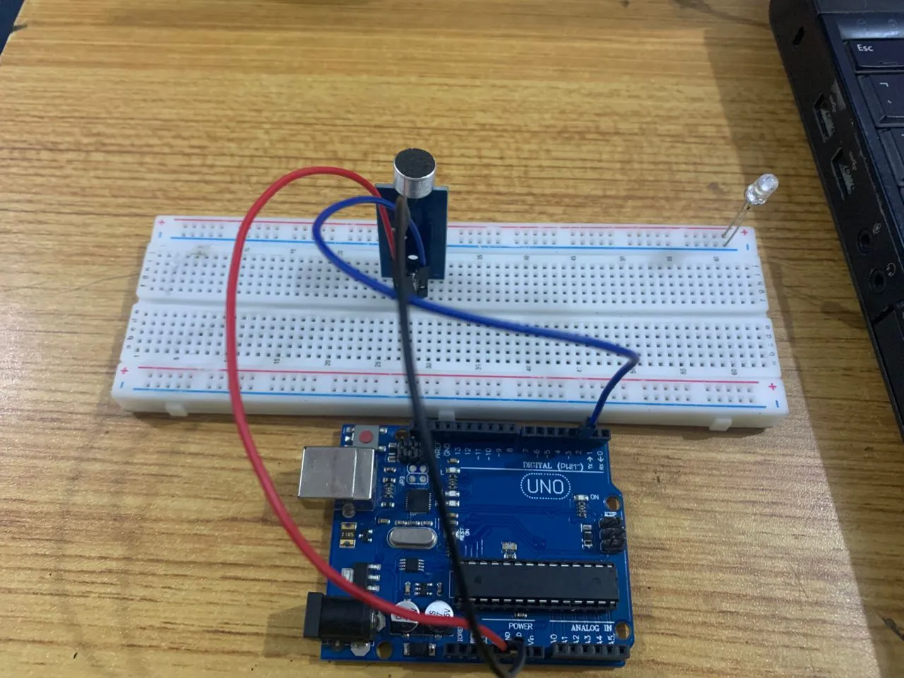 fix the white LED into the breadboard